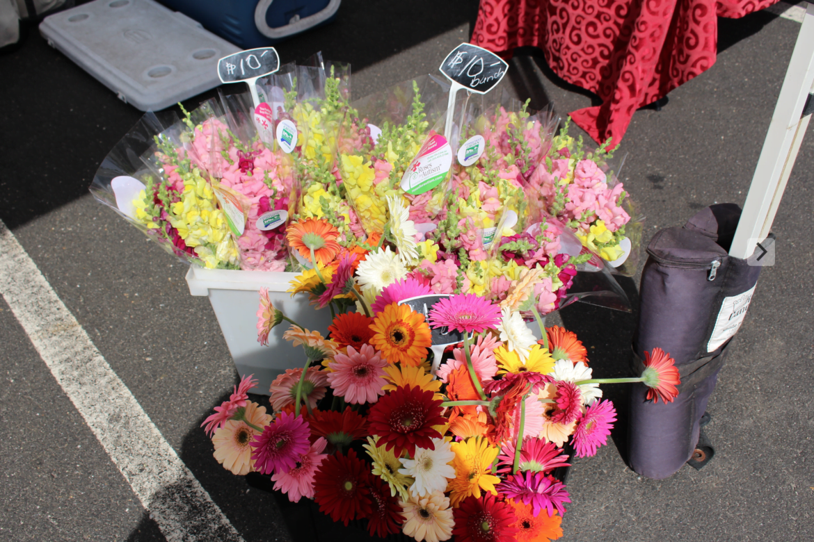 The Roses for Autism flower stall at the Greenwich Farmers Market, July 2015 Photo: Leslie Yager