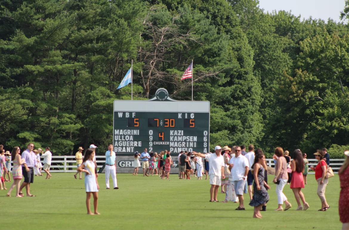     Action at the Greenwich Polo Club on Sunday, July 12. Credit: Leslie Yager