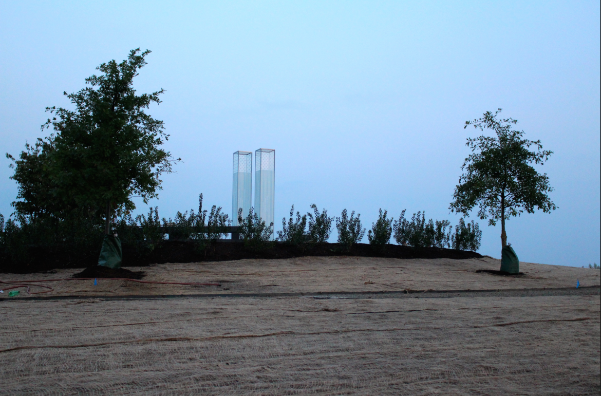 newly planted trees surround the Sept 11 memorial in Cos Cob Park