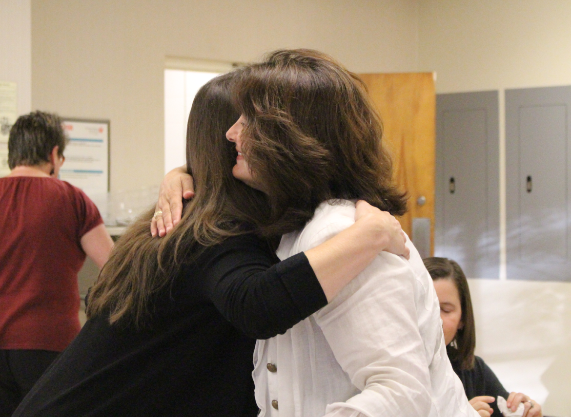 Margret Callahan gets a hug from visiting Leibnizschule English teacher Karin Augenstein. Credit: Leslie Yager