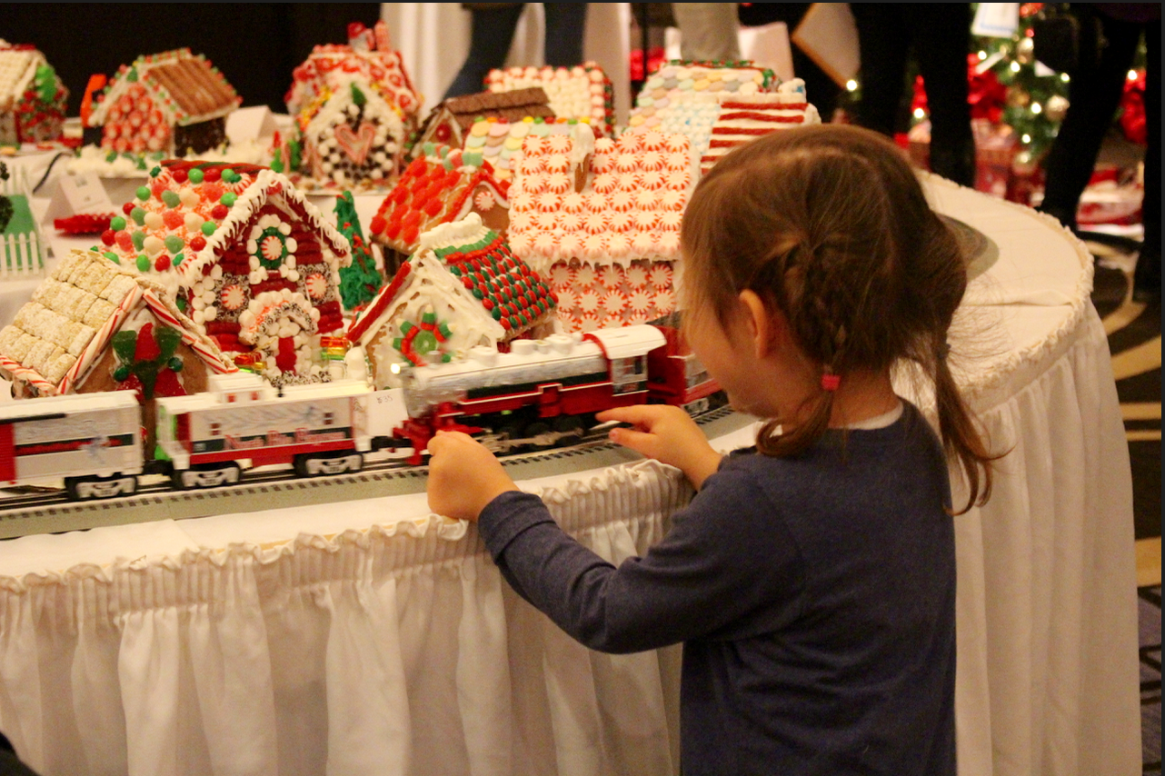 Children of all ages enjoyed the gingerbread houses at the Enchanted Forest 2015. Credit: Leslie Yager