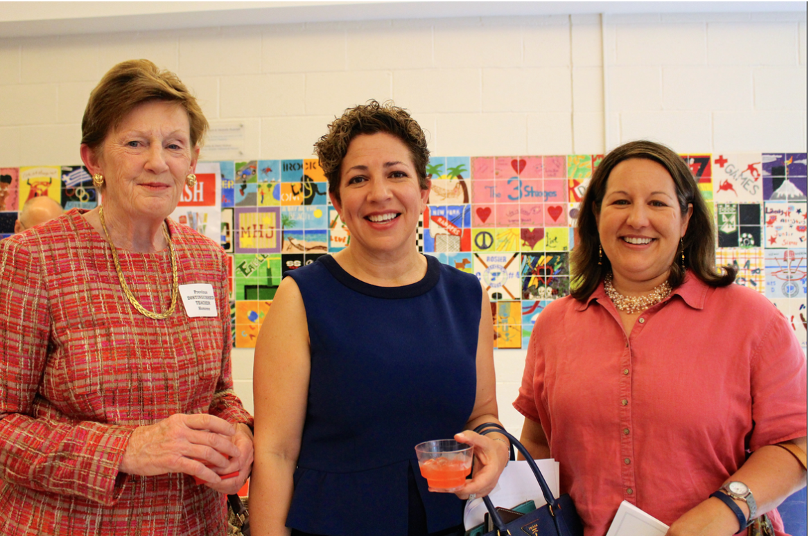 Flanked by Barbara O'Neill and Lisa Beth Savitz at the 2014 Distinguished Teacher Award ceremony at Central Middle School. Credit: Leslie Yager