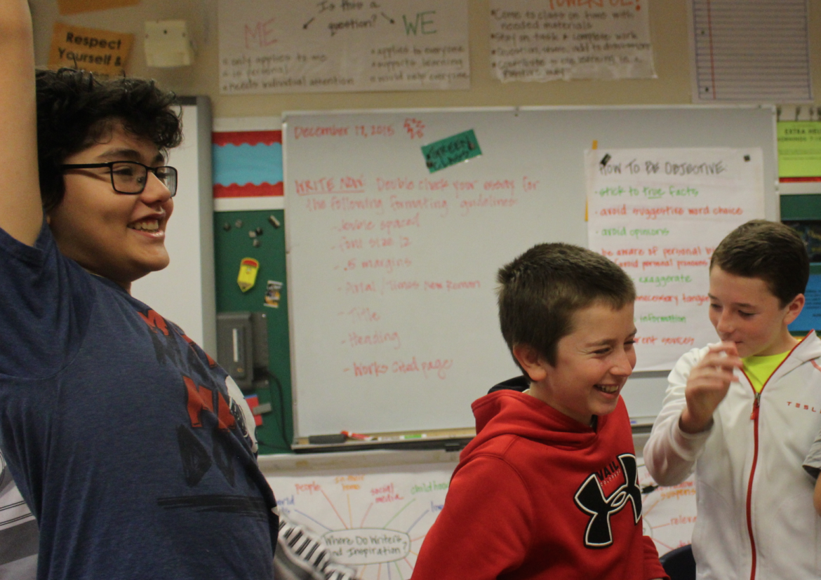  Ryan, Toby and Lucas laughing after a group quiz bowl cheer. Dec. 17, 2015. Credit: Leslie Yager