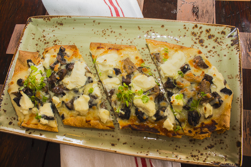 Crispy Flatbreads done right - Roasted Mushrooms and Truffled Cheese... yum! Credit: Karen Sheer