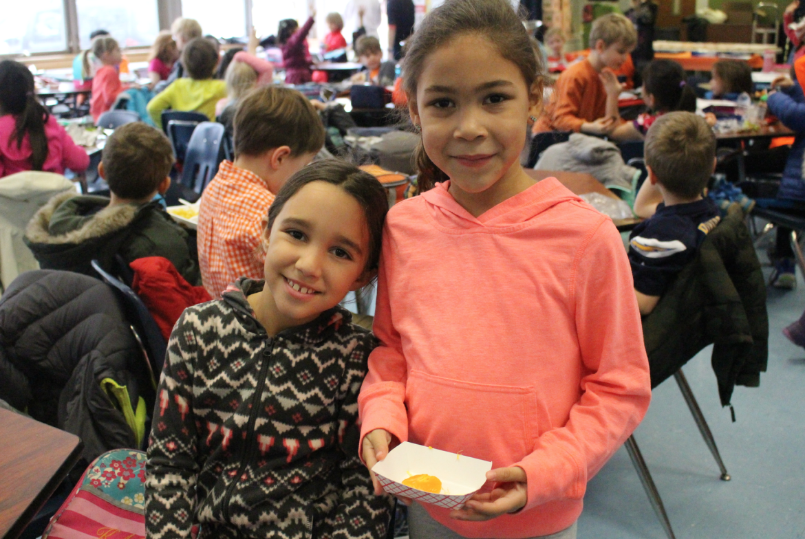     One bite left... sampling clementines on Tuesday at North Mianus School, Jan. 26, 2016 Credit: Leslie Yager