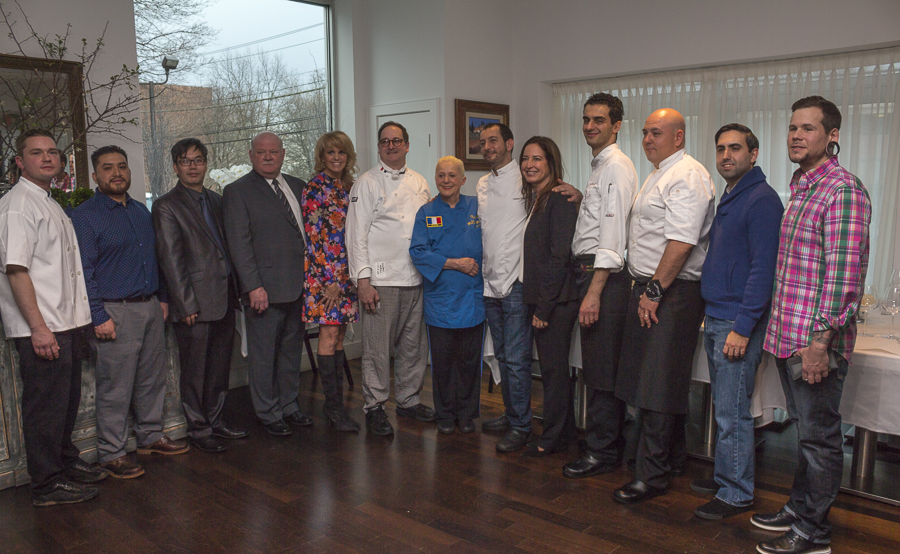 Norman and Gerri pose with some participating chefs, who discussed their visionary specialties to be served at the benefit. Credit: Karen Sheer