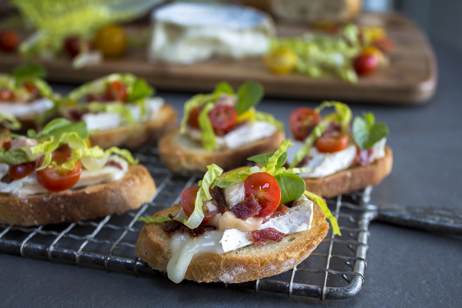 Crisp garlicky toasts piled with oozing brie cheese, bacon, lettuce and tomato. Credit: Karen Sheer