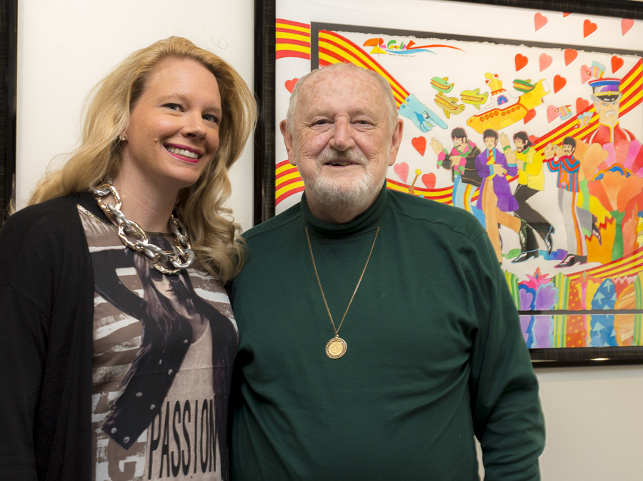 Tiffany proudly poses with Ron, who is making a special appearance at the C. Parker Gallery. Credit: Karen Sheer