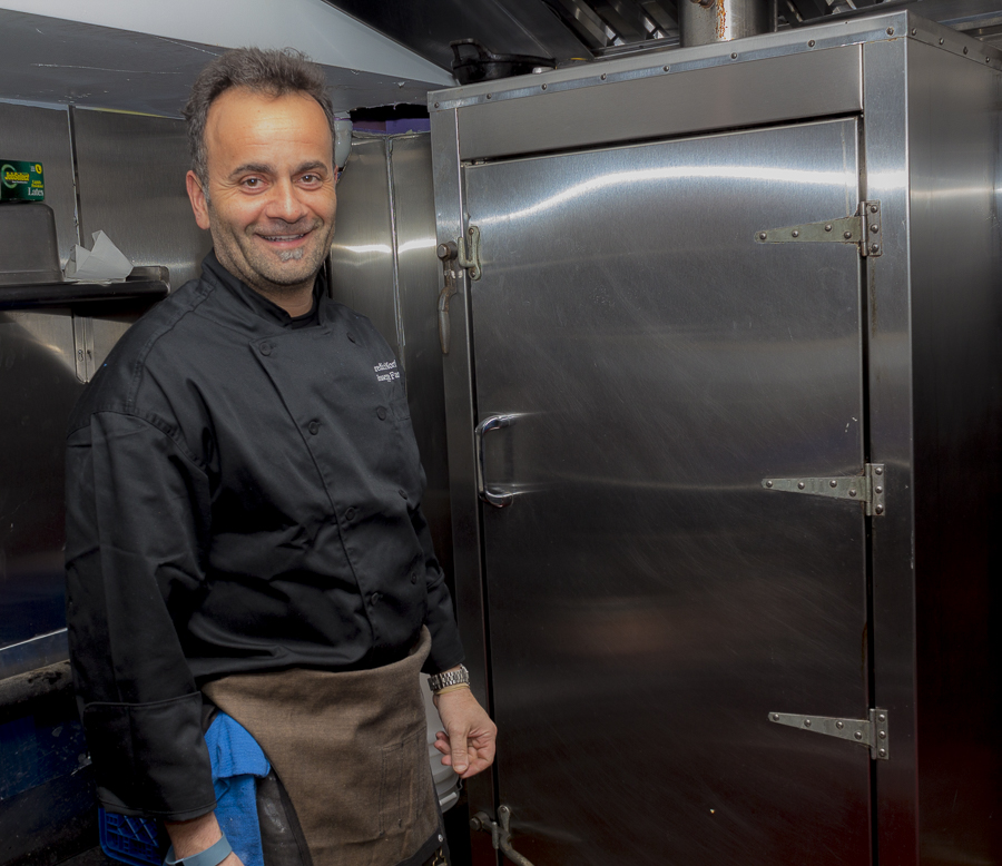 Chef Fanelli and his smoker - for meats, seafoods and beyond. Credit: Karen Sheer