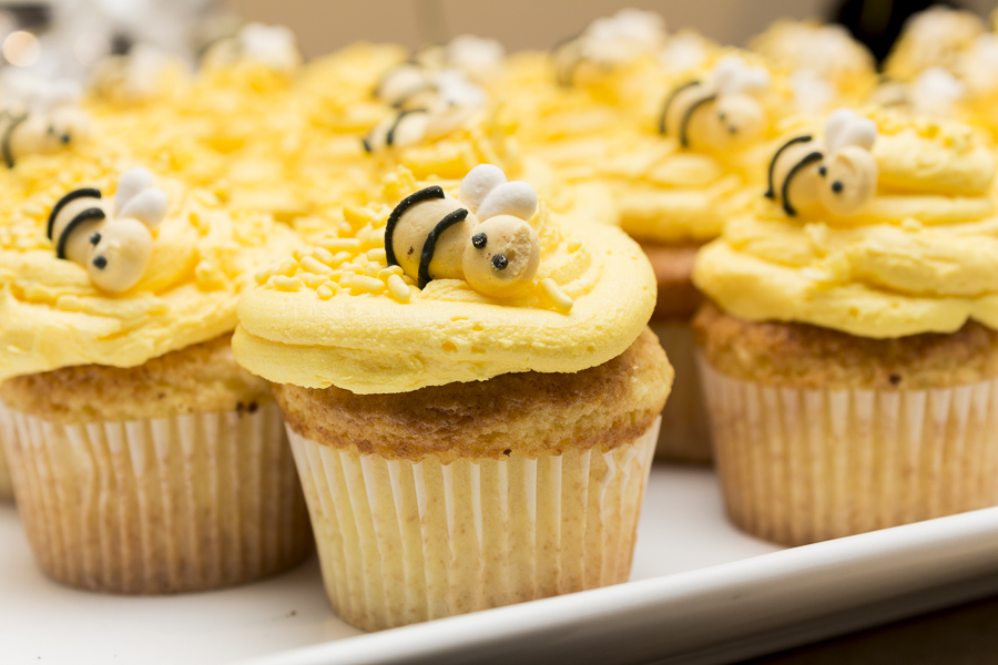 Delicious cupcakes with whimsical bee decorations by "Happiness Is Catering" Credit: Karen Sheer