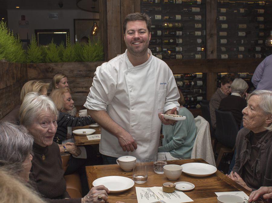 Chef Lazlo, who grew up in Greenwich, chats with his guests and serves some dessert. Credit: Karen Sheer
