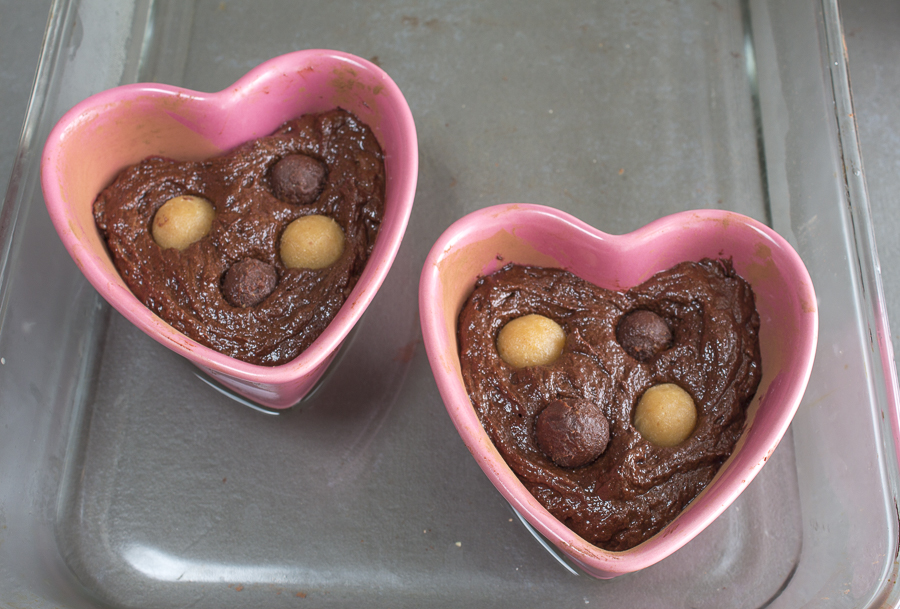 Fill the ramekins three-forths full, drop in truffles and bake. Credit: Karen Sheer