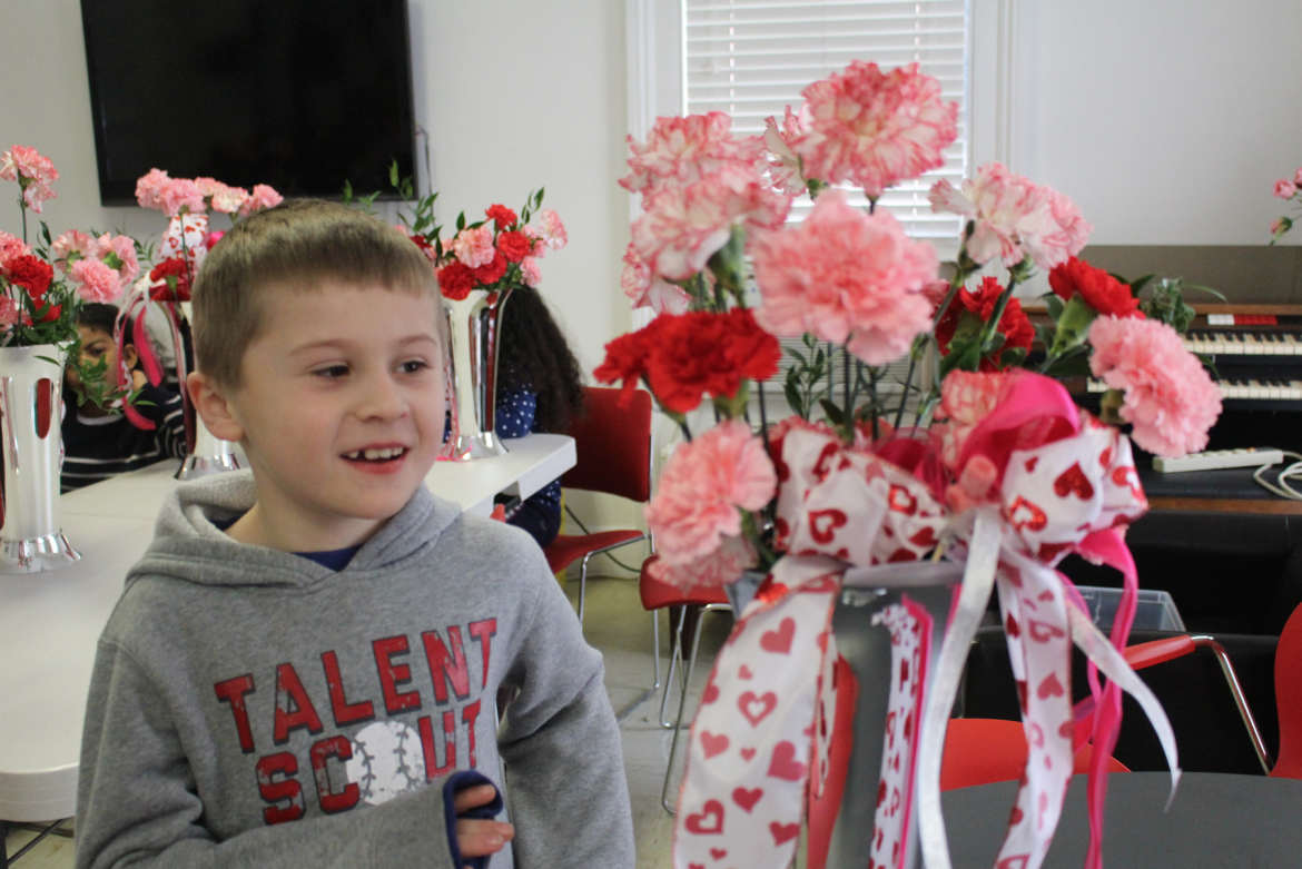  At CCI, Kevin admires the Valentine's Day flowers he arranged, Feb. 12, 2016 Credit: Leslie yager