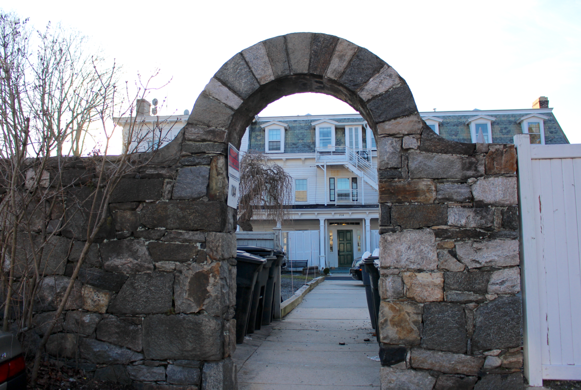 arched entrance to sun dial apartments