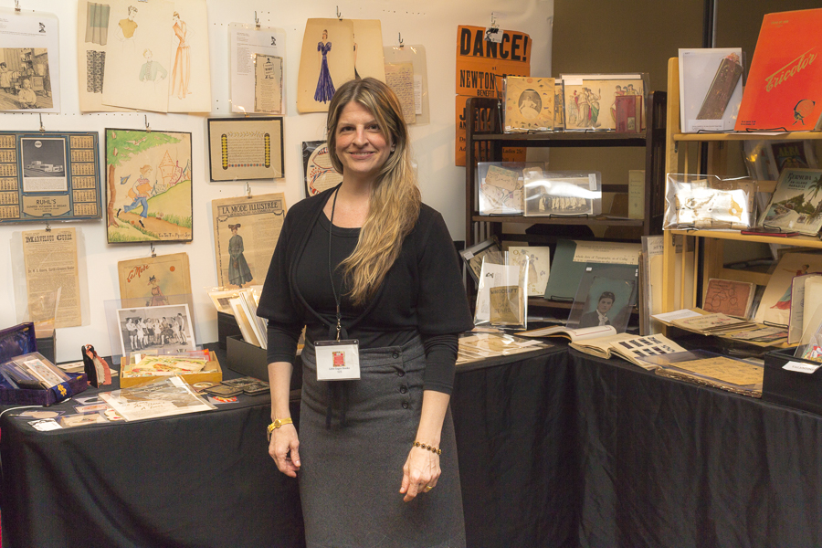 Kara Accettola of Little Sage Books in her booth. She collects ephemera depicting women in history. Credit: Karen Sheer