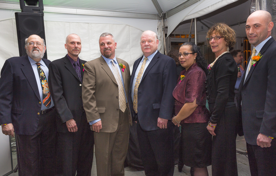 Honoring EMS services, Lloyd Miller, Scott Moore and Joe Bilotto with Norman G. Roth. Credit: Karen Sheer
