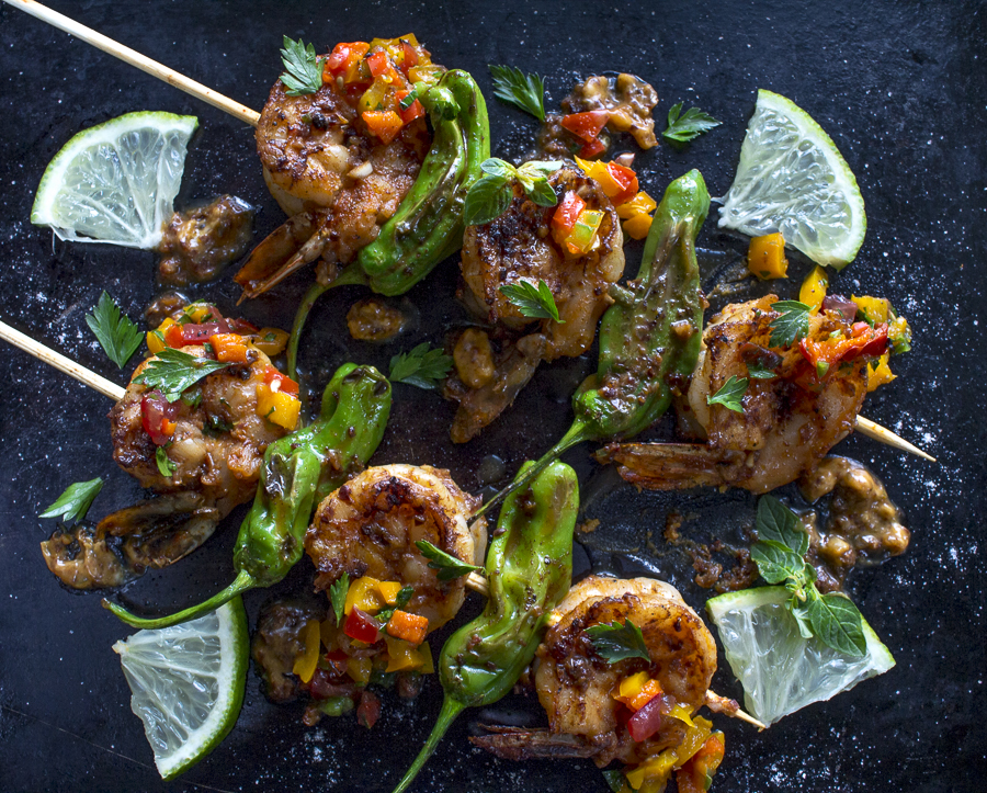 Grilled Shrimp with Padrón Peppers ~ Ancho Chile Spiked Compound Butter. Credit: Karen Sheer