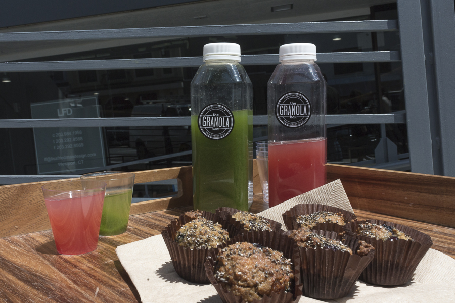 Samples of freshly pressed juices and Paleo blueberry muffins outside the restaurant. Credit: Karen Sheer