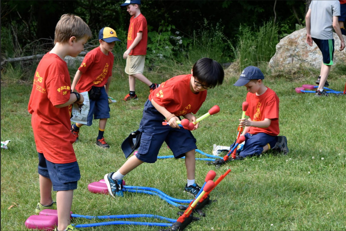 Pack 35 Cub Scouts tackle the dual stomp rockets at the Intergalactic Cub-o-ree at Seton Scout Reservation in Greenwich.