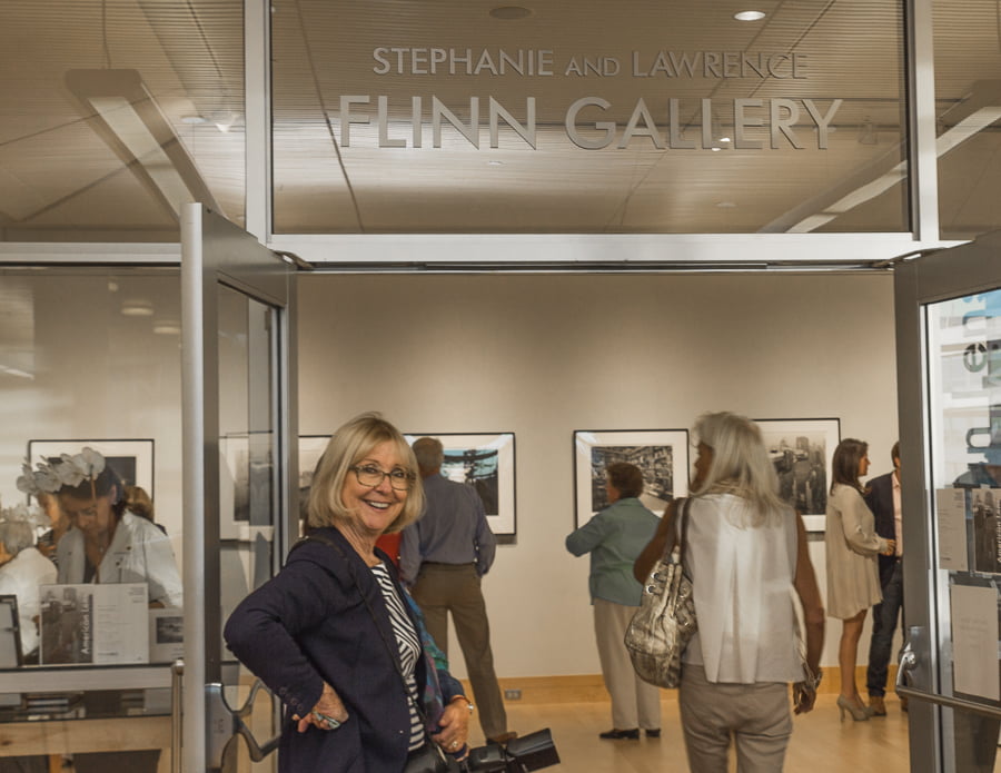 Kathy DiGiovanna, photographer and commmitte member at the entrance to the Flinn Gallery. Credit: Karen Sheer