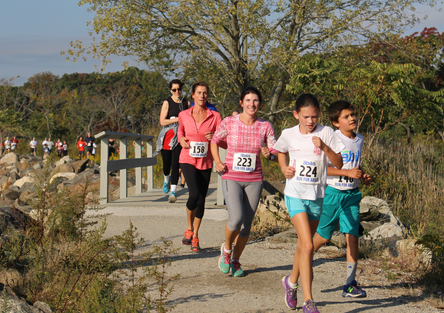 Despite a small detour caused by a super high tide, the runners in the inaugural Abilis 5K run enjoyed a scenic route around Tod's Point, Oct. 16, 2016 Credit: Leslie Yager