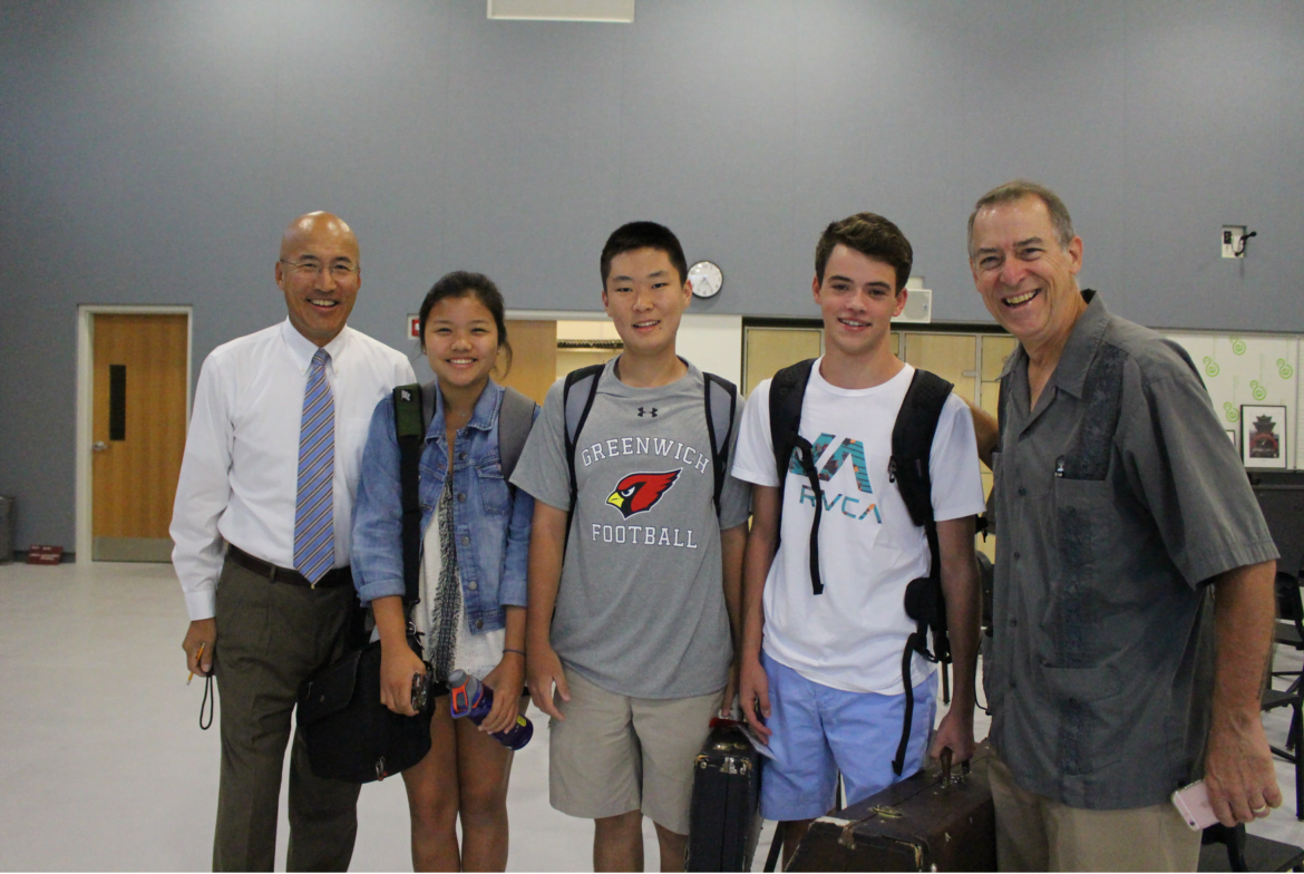 John Yoon and Ben Walker with students on the first day of school, Aug 31, 2016 Credit: Leslie Yager