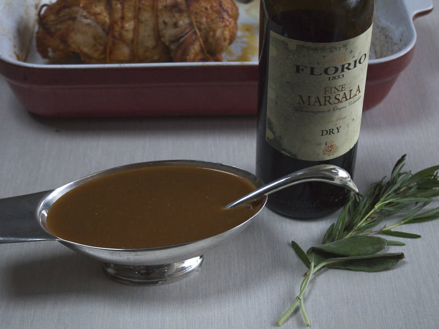 Drizzle some gravy over the sliced turkey, serve the rest in a gravy boat and pass to your guests