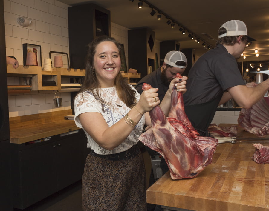Sophie Grant, director of Marketing at Fleishers with the butchers. Credit: Karen Sheer