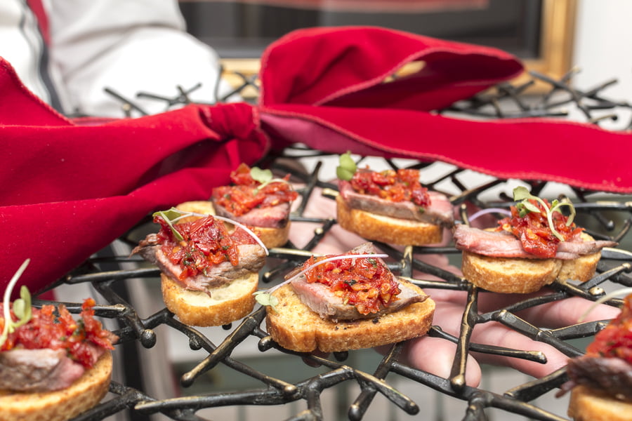 Beef Tenderloin on Baguette Slices with Tomato Concasse. Credit: Karen Sheer