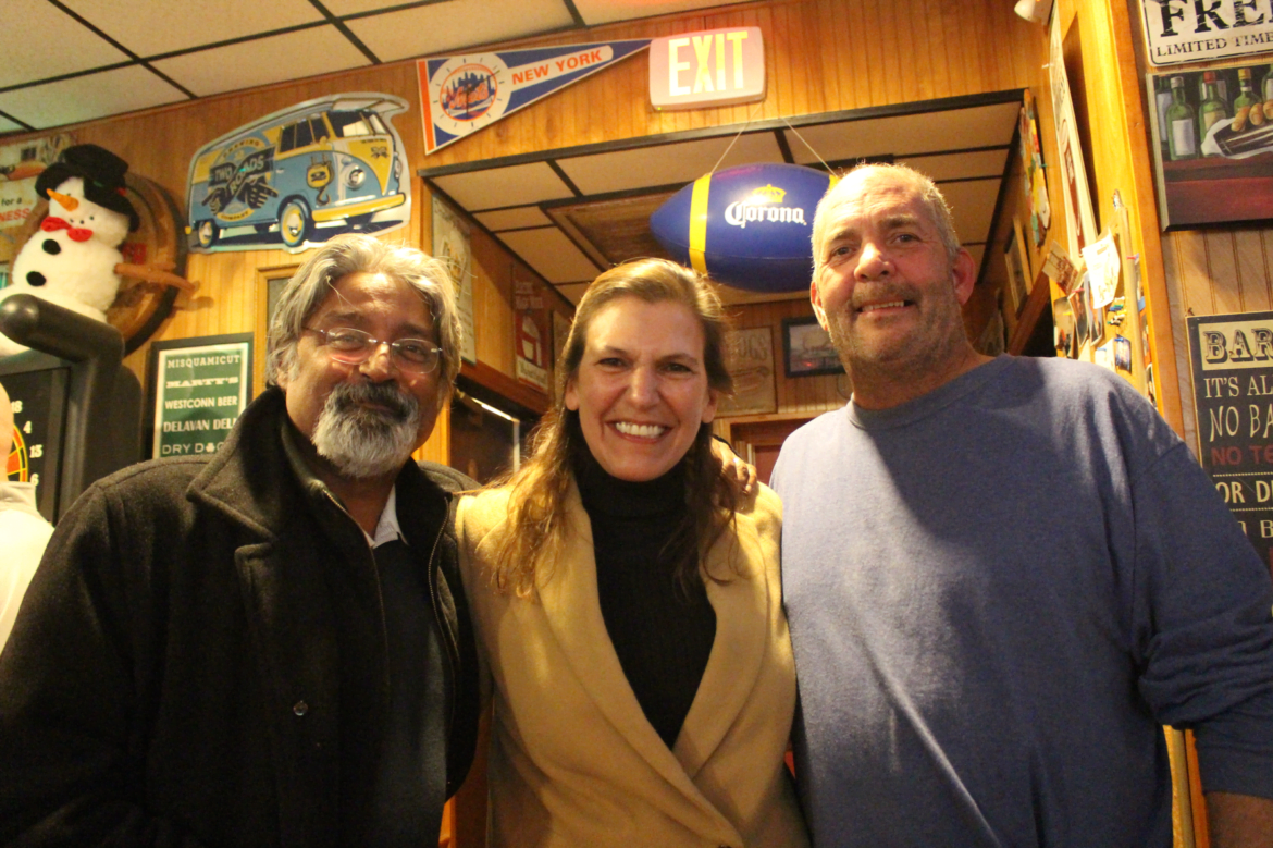 Sanjay Santhanam, longtime friend and member, with Joyce and Tom Donnelly at the Polish Club on Arch Street Thursday, Dec. 15, 2016 Credit: Leslie Yager
