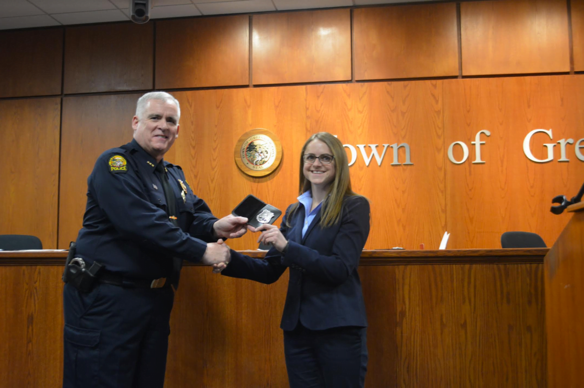  Alexandra S. Boschetto receiving her badge from Chief Heavey