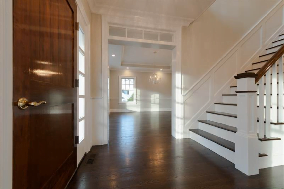 Well sized Grand Foyer with view to Living Room and Wide Staircase to 2nd Level