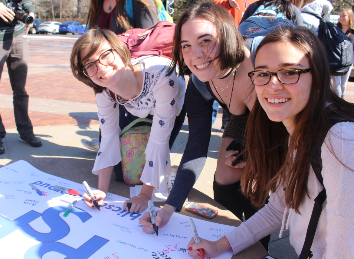 Greenwich High School students signed a banner to show support for the Public School Proud movement. Feb. 28, 2017 Photo: Leslie Yager