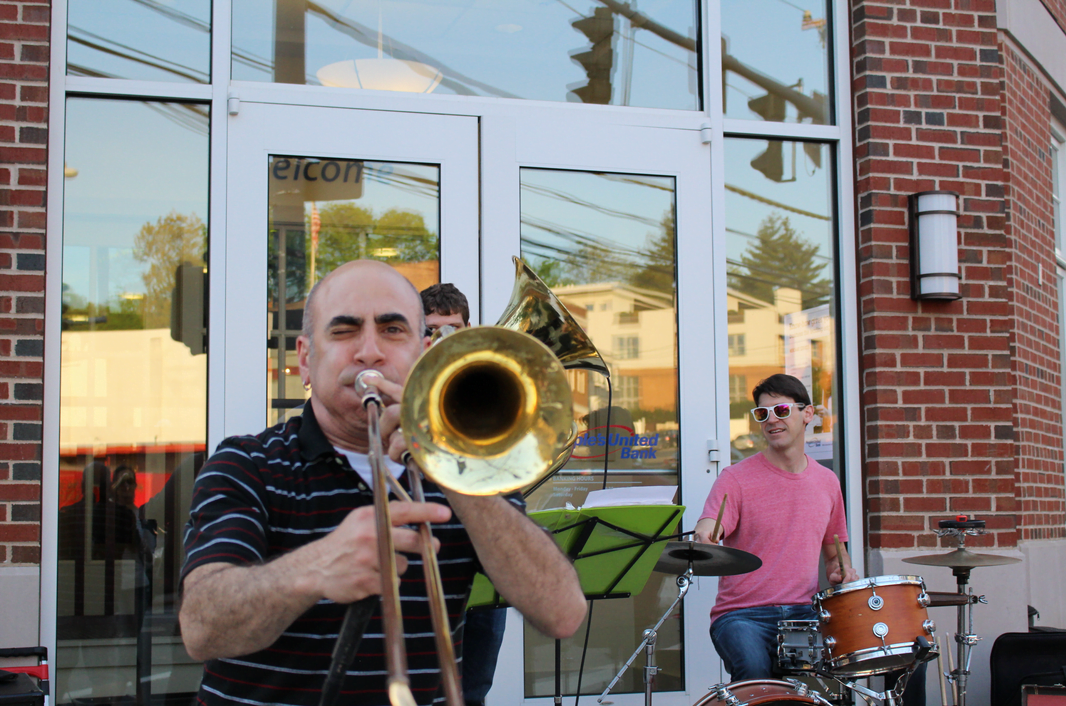 Vincent Nobile of the Trummytones on trombone greeted passers by during the Art-to-the-Ave kick off party.