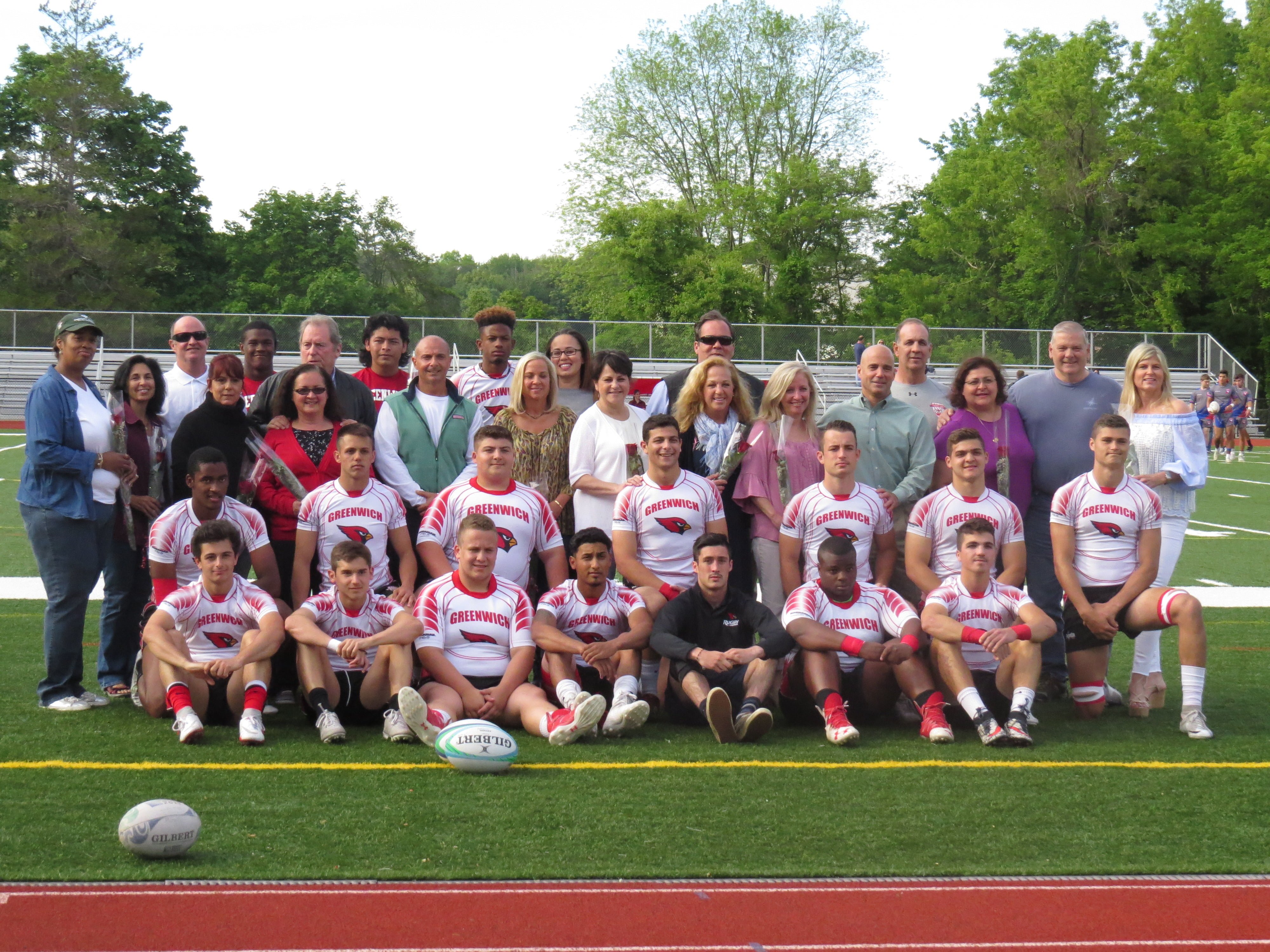 GHS Rugby senior players pose for a photo with their families. May 24, 2017. Photo: Devon Bedoya