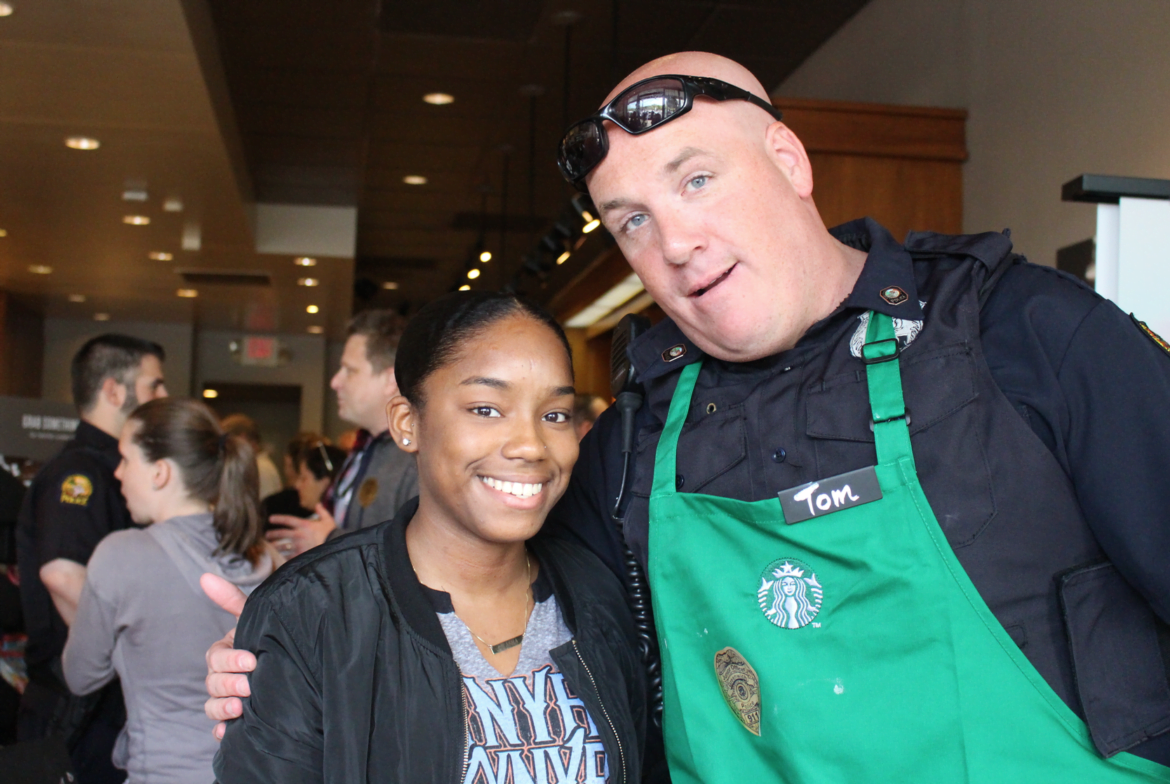 Rasha Hill and Officer Tom Heustis at Coffee with a Cop. May 2, 2017 Photo: Leslie Yager