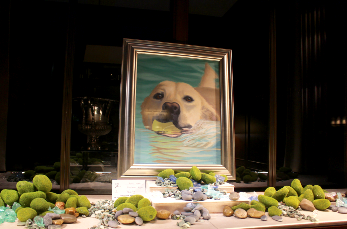 Happy Dog by Felicity L. Kostakis in the window of Betteridge. May 4, 2017 Photo: Leslie Yager