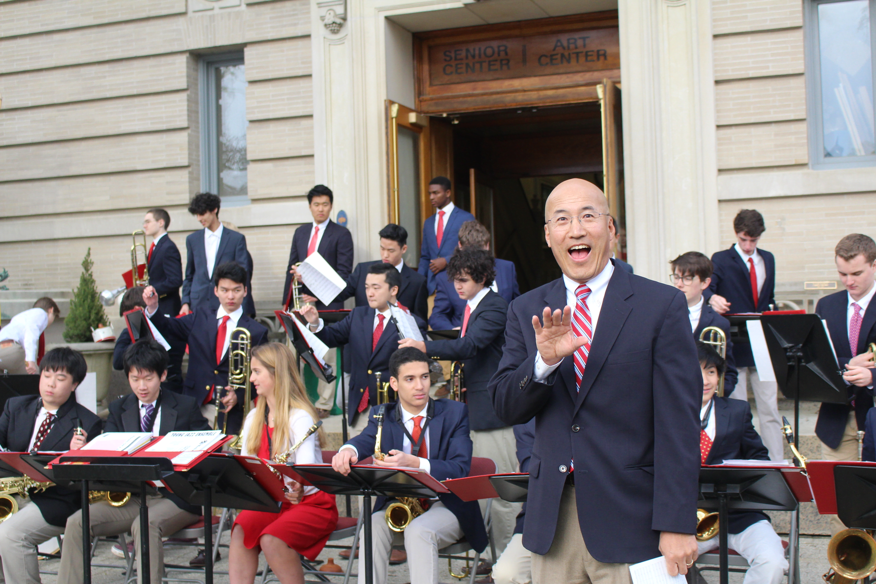 GHS band director John Yoon greeted guests outside the Greenwich Arts Council. May 4, 2017 Photo: Leslie Yager