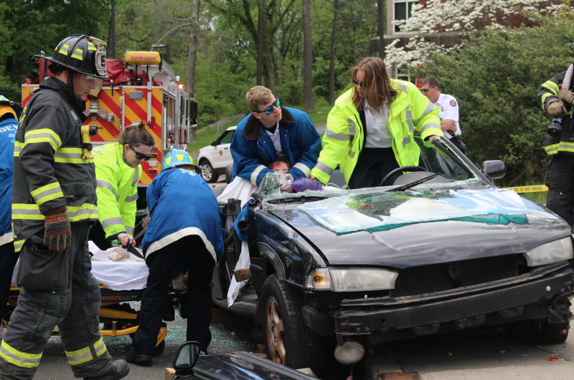 A second passenger in the simulated distracted driving crash at Greenwich High School was severely injured. May 9, 2017 Photo: Leslie Yager