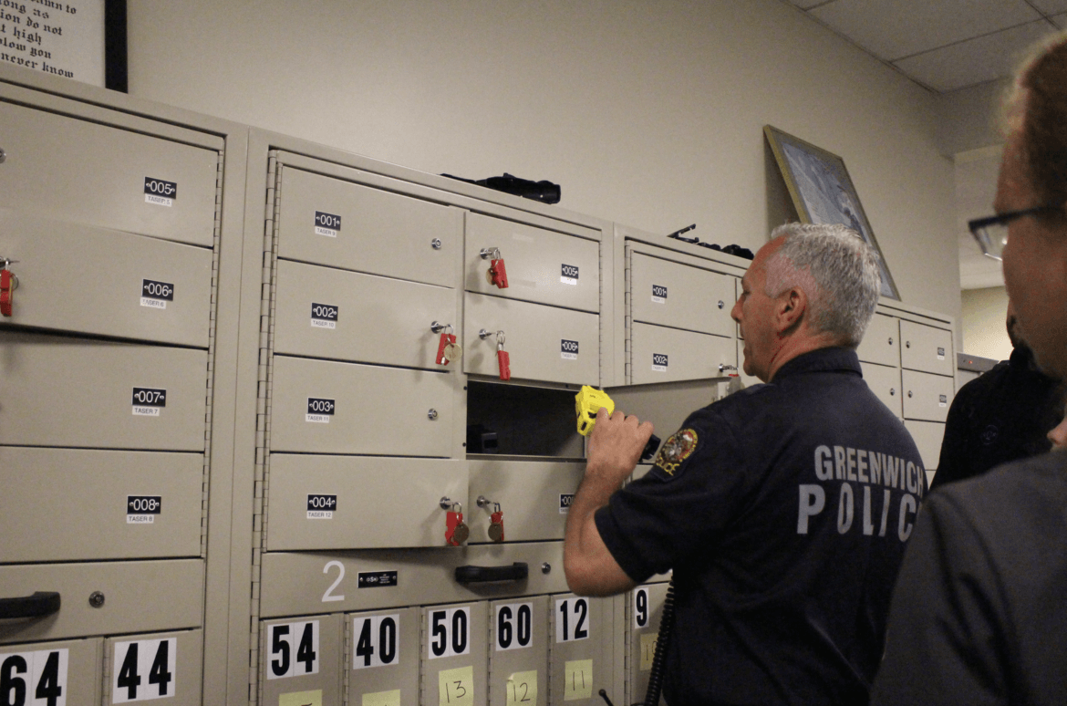 Technician Robert Ferretti pointed out the weapons bank where tasers and rifles are kept under lock and key when not out with an officer during a shift. May 13, 2017 Photo: Leslie Yager