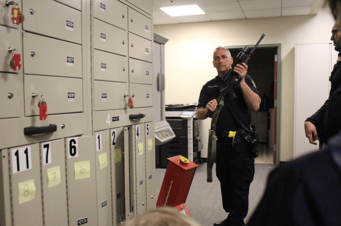 Technician Robert Ferretti pointed out the weapons bank where tasers and rifles are kept under lock and key when not out with an officer during a shift. May 13, 2017 Photo: Leslie Yager