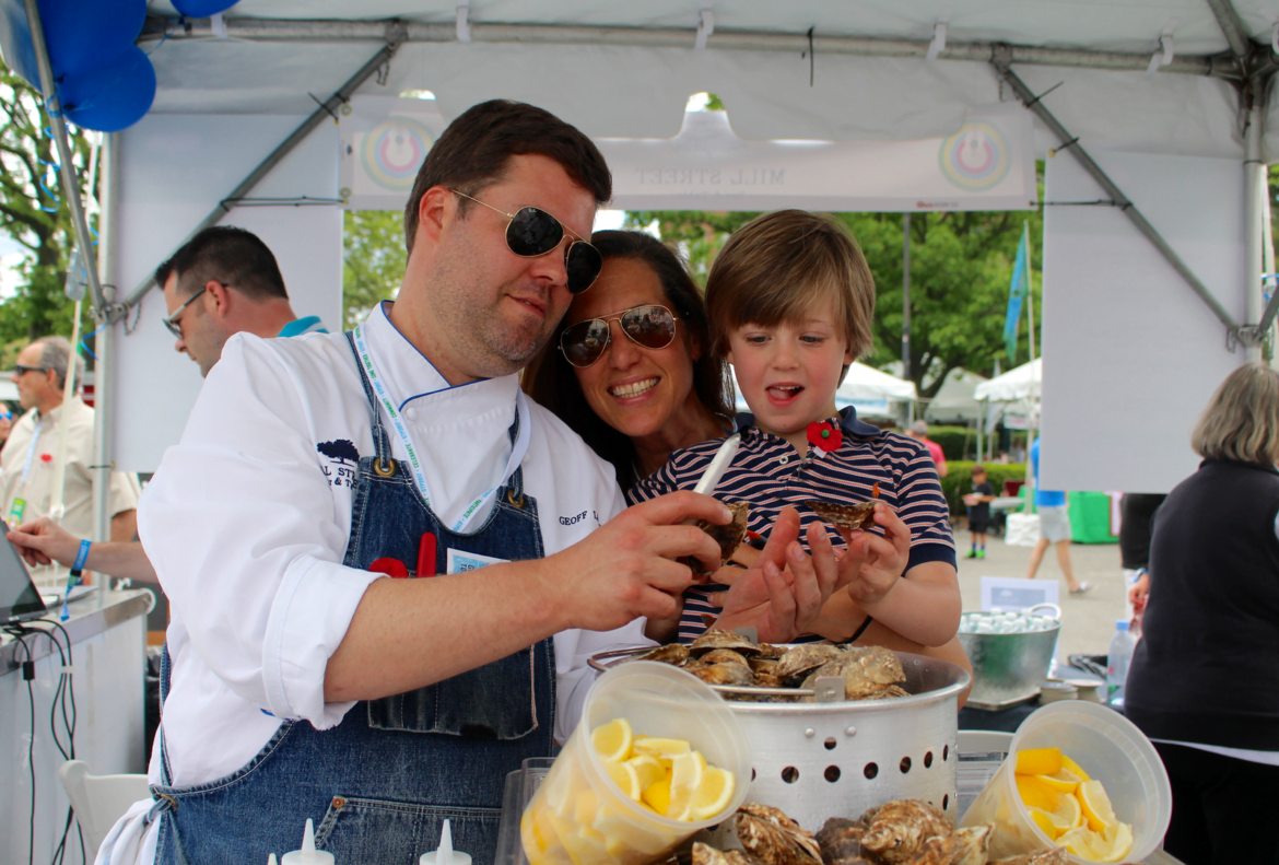 Mill Street Bar & Tavern chef Geof Lazlo with wife Jody and son Lucas at Greenwich Town Party, May 27, 2017 Photo: Leslie Yager