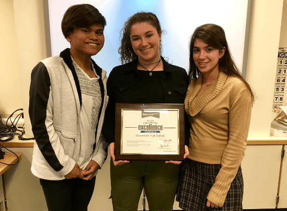 Cholo Cruz, Eden Kaufman, and Gaia Fakhoury show off an award for the 2016 yearbook. Contributed photo.