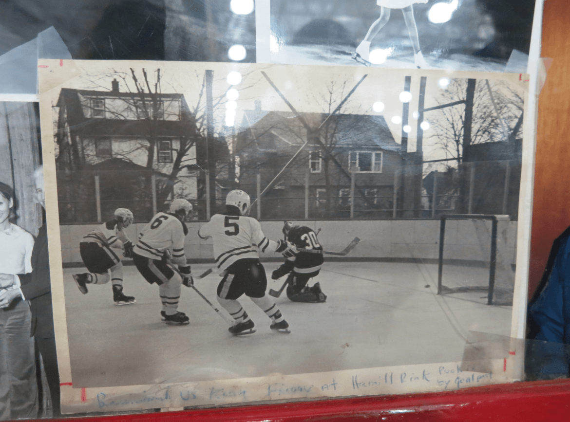 Hamill Rink evolved from an open air rink built on a slab by the old Byram School in 1971. This black and white photo is on the wall inside the rink.
