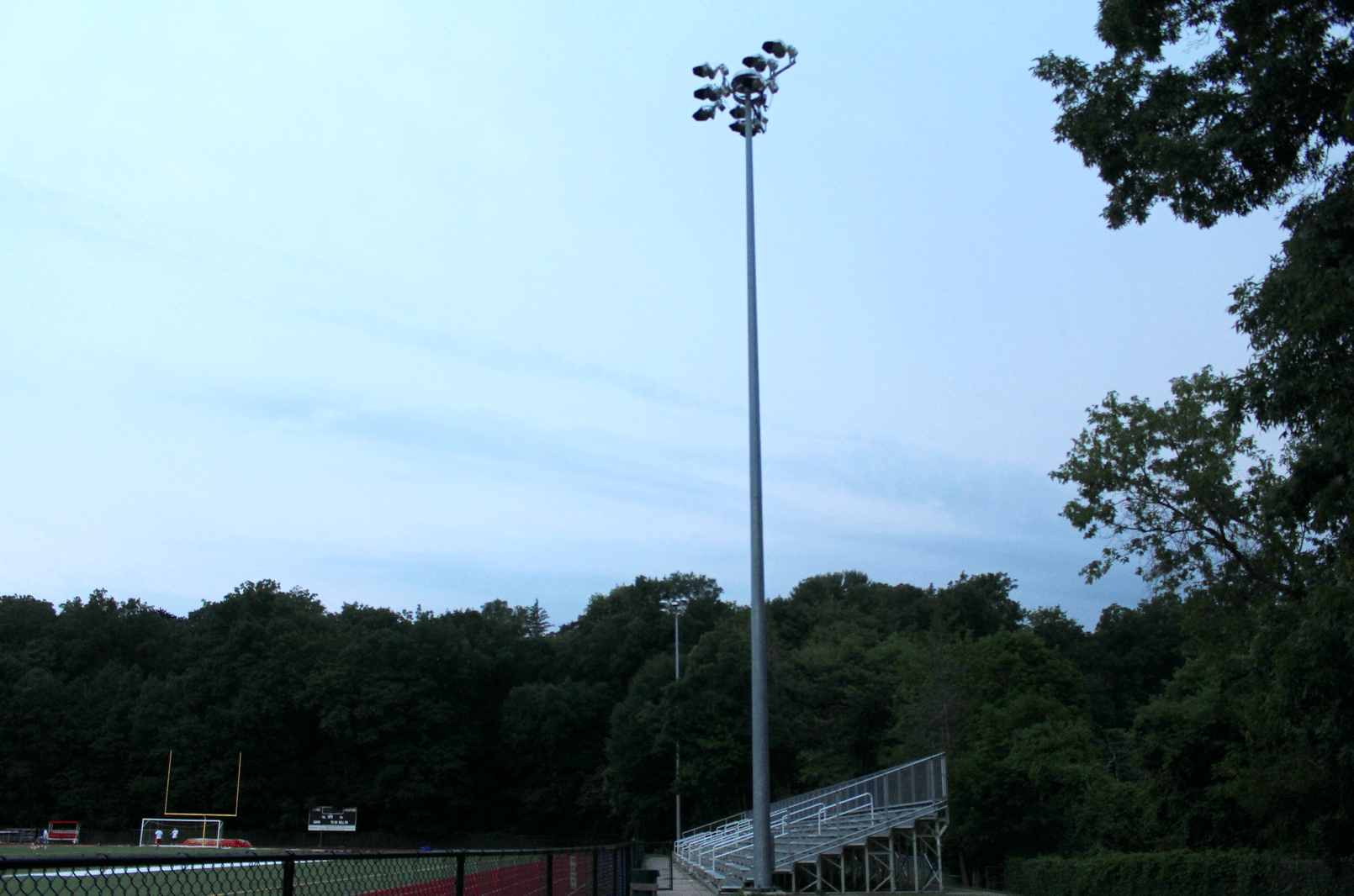 Lights at Cardinal Stadium at Grenewich High School at dusk. July 17, 2017 Photo: Leslie Yager