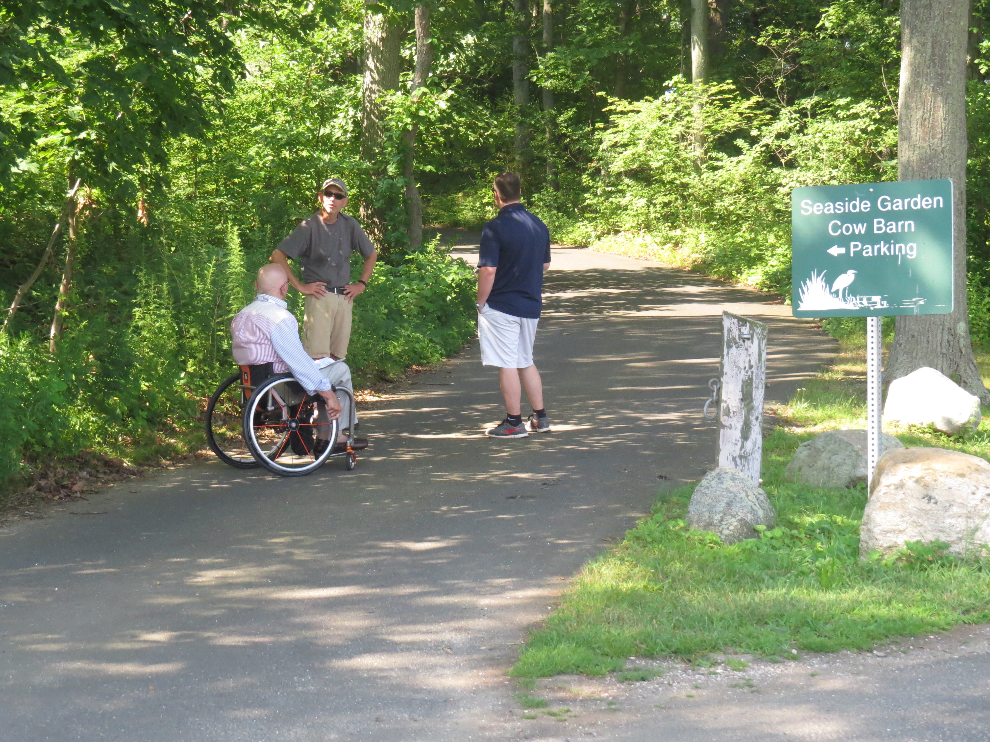 Joe Dowling and Alan Gunzburg agree that this roadway should become a footpath in order for the new bathroom to be accessible. July 19, 2017. Photo: Devon Bedoya