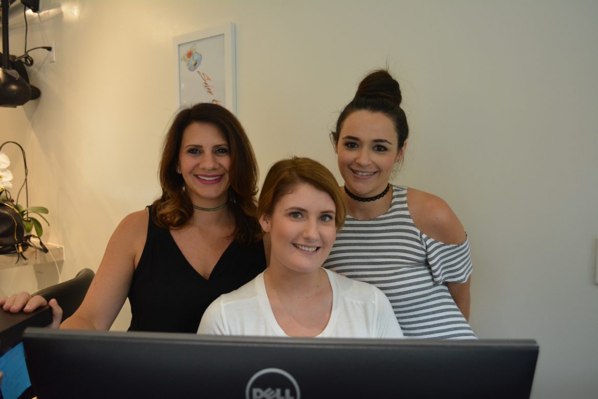 Owner Daniela Hernandez, Receptionist Brighton, and Colorist Connie Fusaro by the front desk. Photo: Sadie Smith