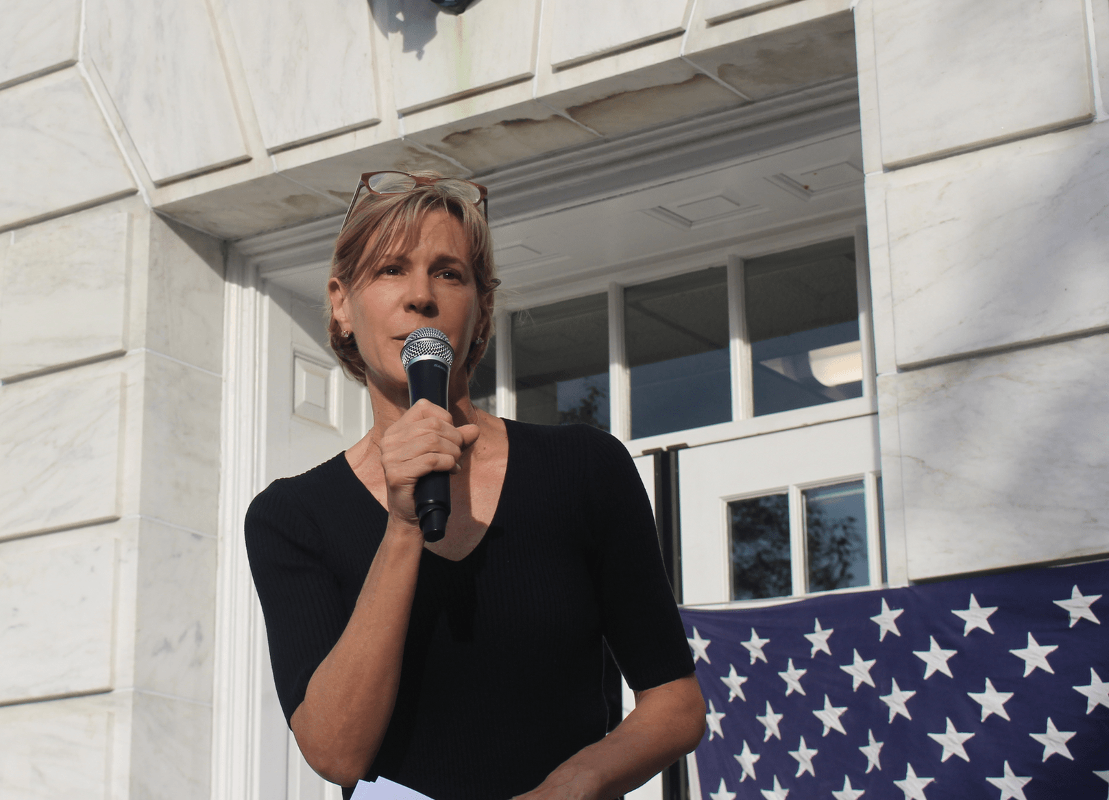 Indivisible Greenwich founder Joanna Swomley addressed the crowd at Greenwich Town Hall on Aug 13, 2017 Photo: Leslie Yager
