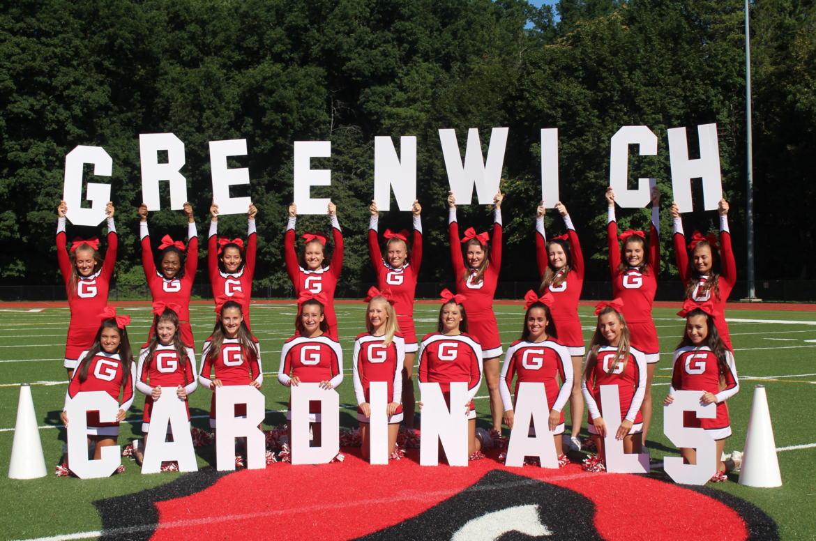 Greenwich High School cheerleaders with their new jumbo letters posed on media day under a bright sun. Aug 20, 2017 Photo: Leslie Yager