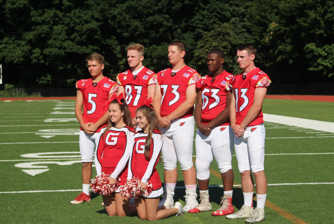 Cardinals Football team captains with two of the cheerleading captains. Aug 2, 2017 Photo: Leslie Yager